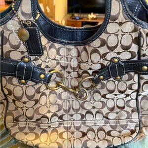 Coach Brown and Tan Signature Clutch